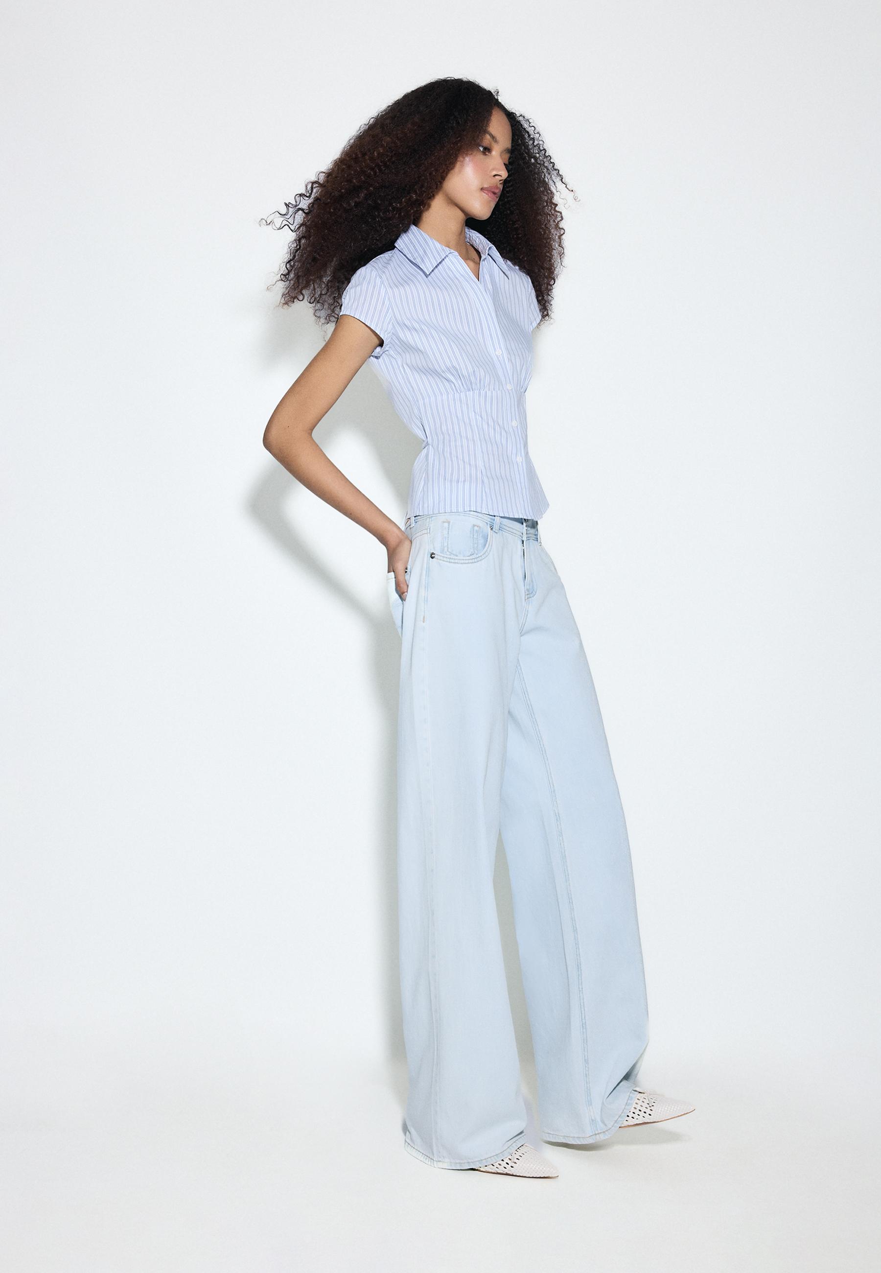 LOW-RISE DOUBLE-BUTTON JEANS