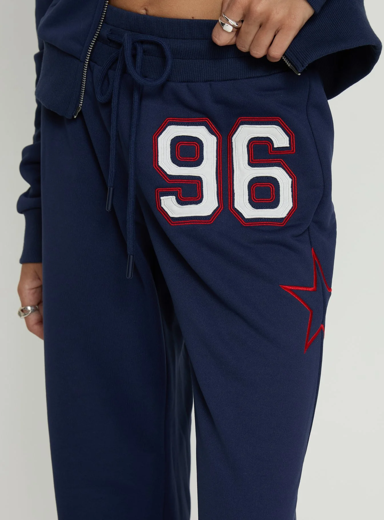 Kari Distressed Patch Track Pant Navy Multi