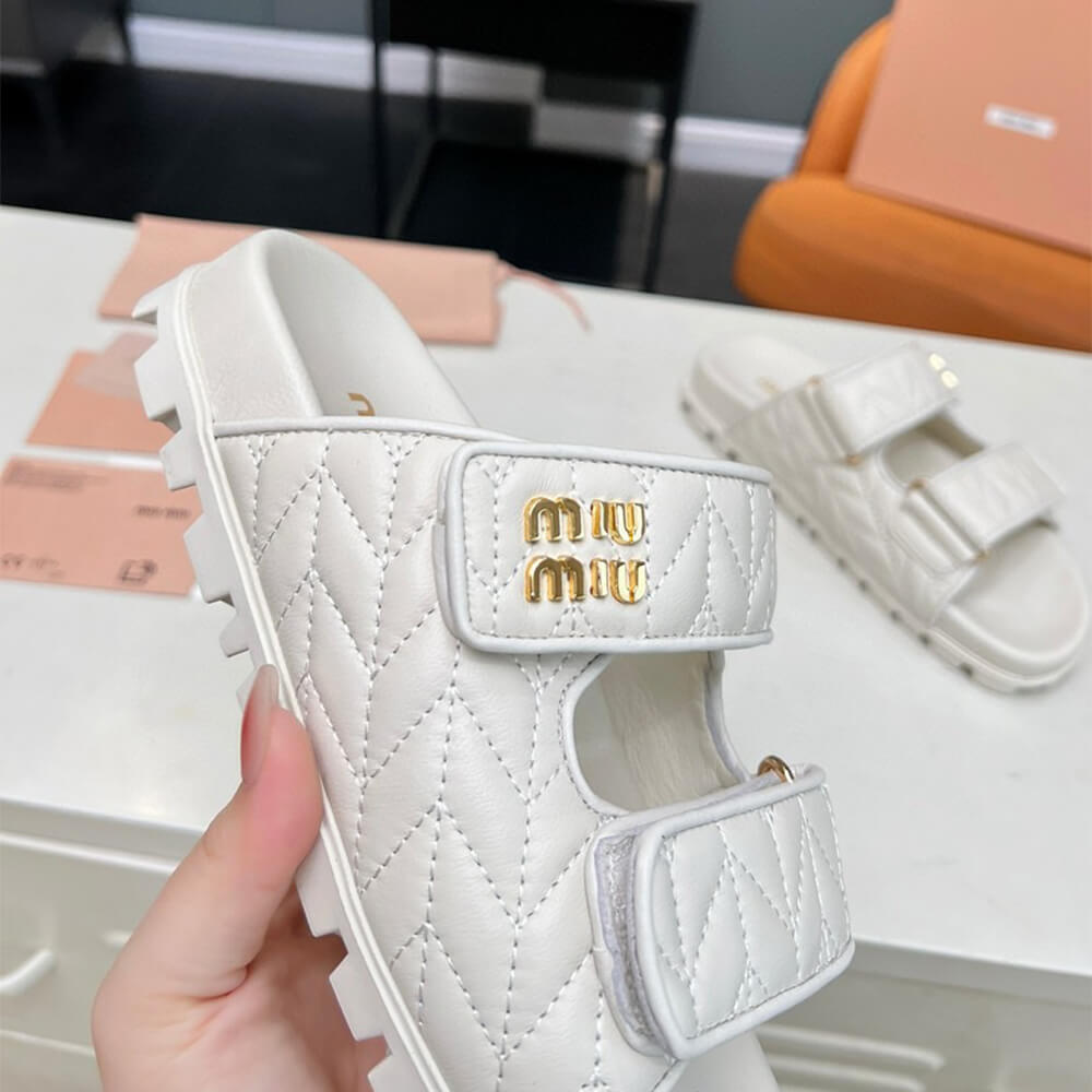 MiuMiu Matelass?? nappa leather slides - Top Club