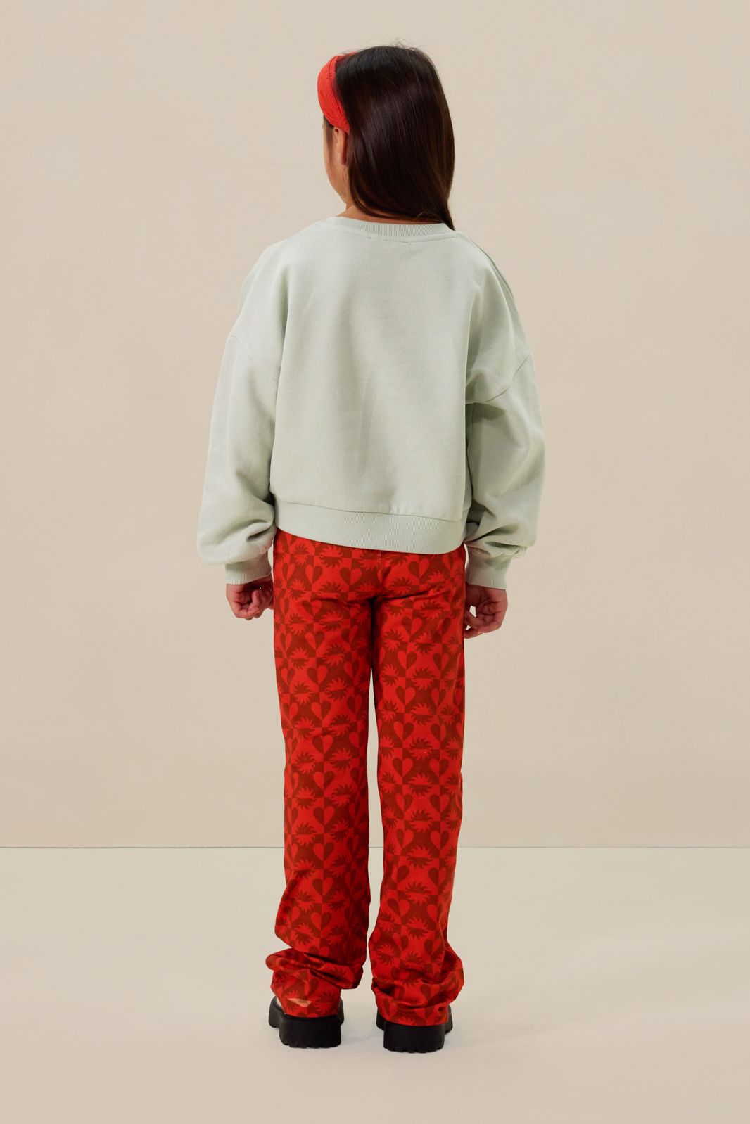 Lichtgroene sweater met tekst