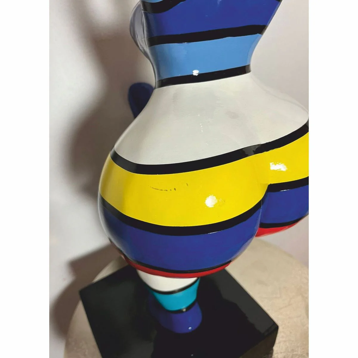 Decorative figure woman doing sports colorful with stripes H. 48 cm - exhibition piece