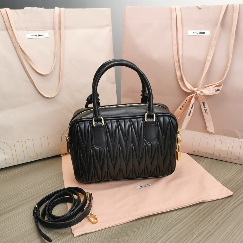 Matelasse nappa leather top-handle bag - Top Club