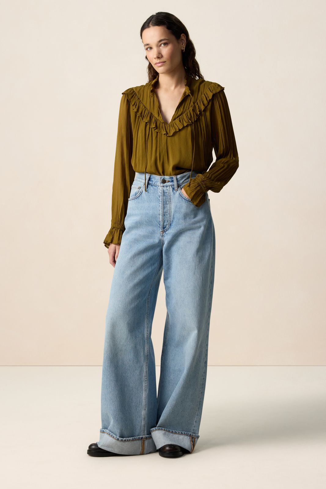 Donkergroene blouse met ruffle