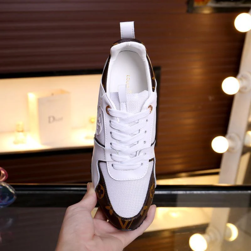 Louis Vuitton Women's White Fashion Sneakers With Signature Patterns And Gold Accents - Sneaker Replica Workshop