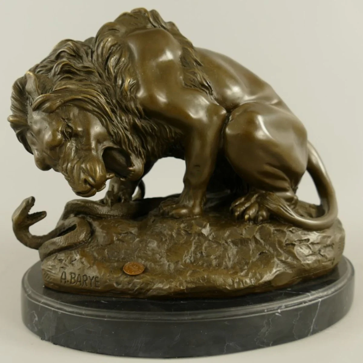 Luxury bronze decorative sculpture lion and snake bronze / black 30 x 19 x H. 24 cm - bronze decorative figure - desk decoration - decorative accessories - luxury accessories