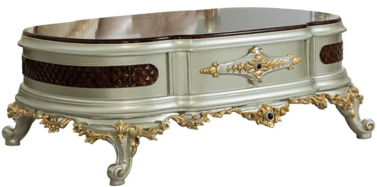 Luxury baroque coffee table dark brown / silver / gold 132 x 95 x H. 50 cm - magnificent solid wood living room table - baroque furniture