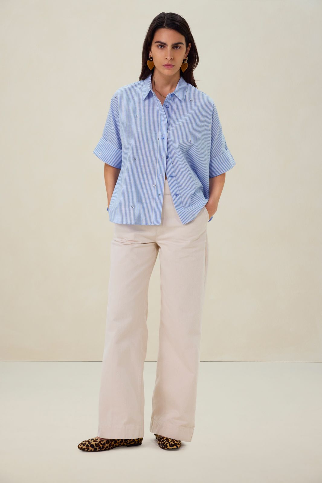 Blauwe blouse met pailletten details