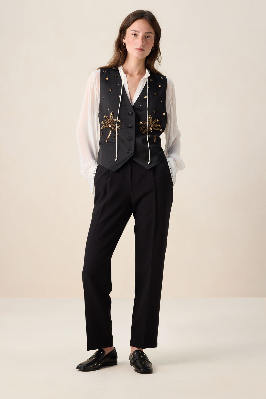 Zwart gilet met palmbomen