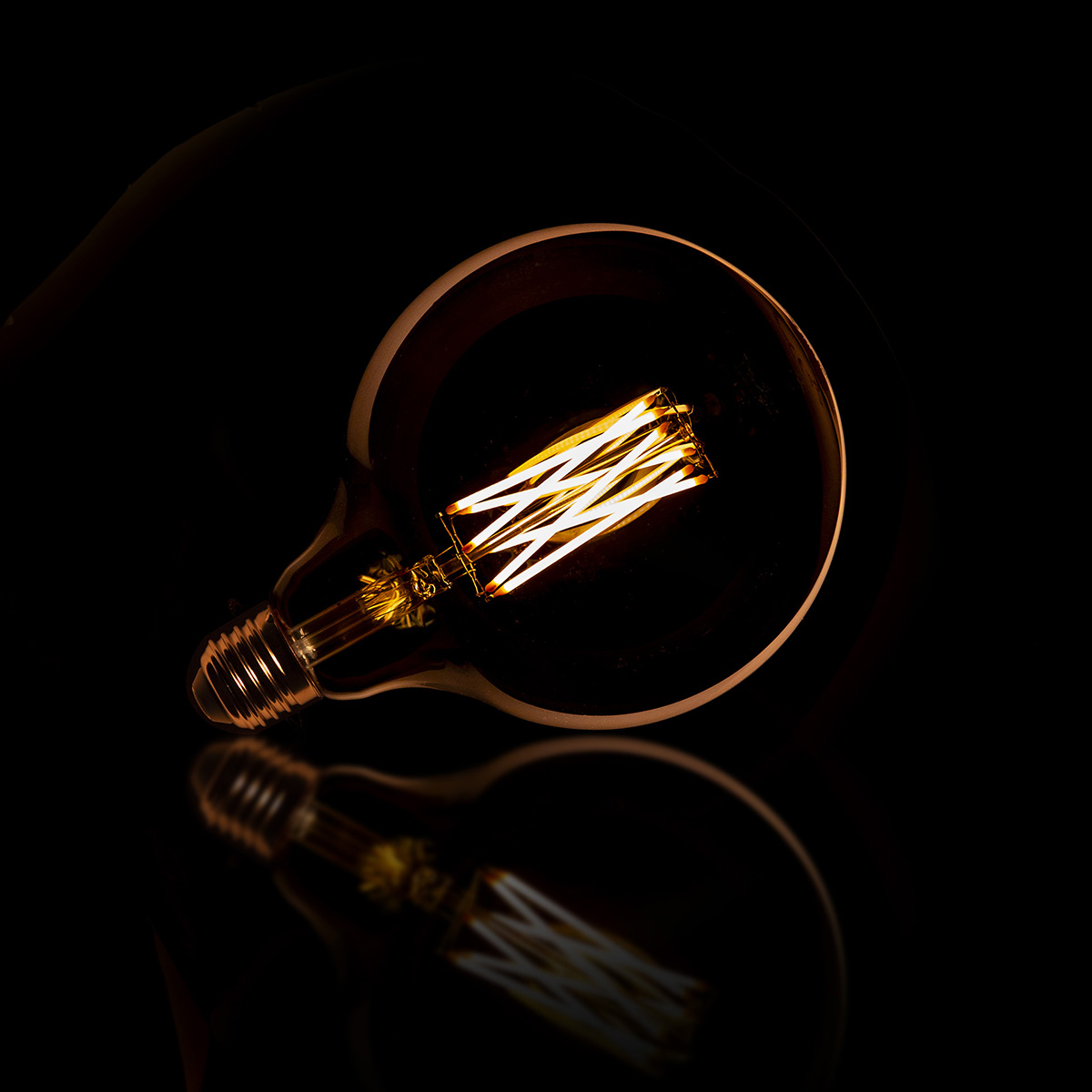 Lamp D - LED lichtbron filament Bol Ø12,5 Amber
