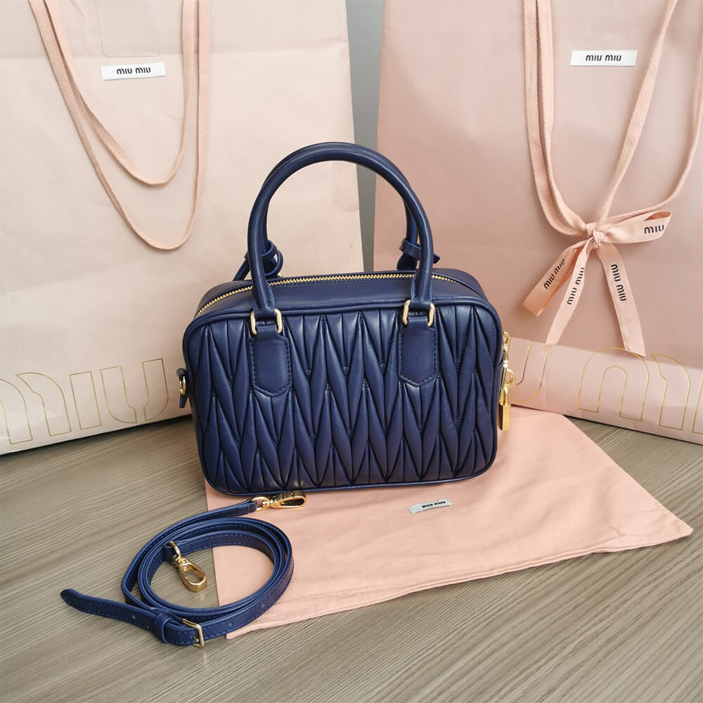 Matelasse nappa leather top-handle bag - Top Club