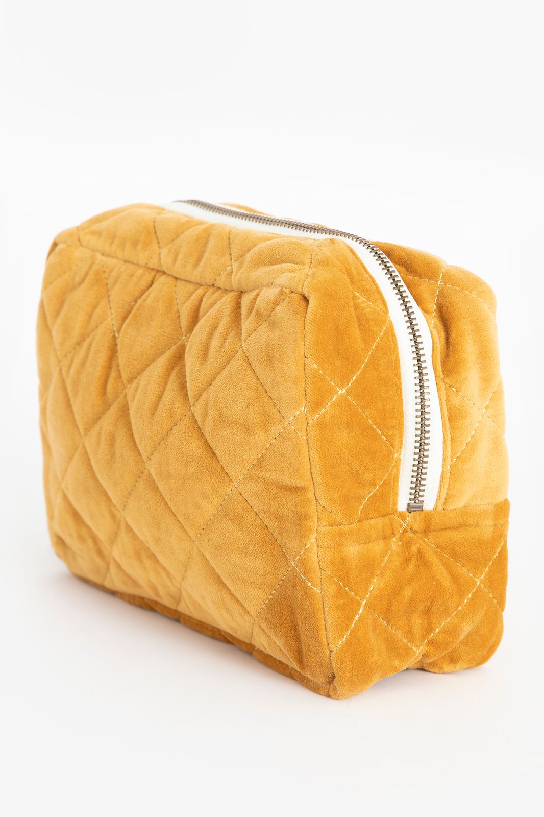 Donkergele velvet toilettas