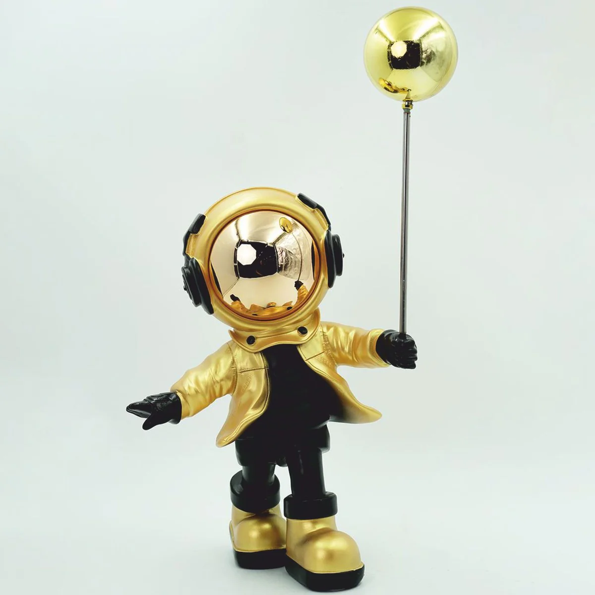 Decorative figure astronaut with balloon gold / black H. 48 cm - decorative sculpture