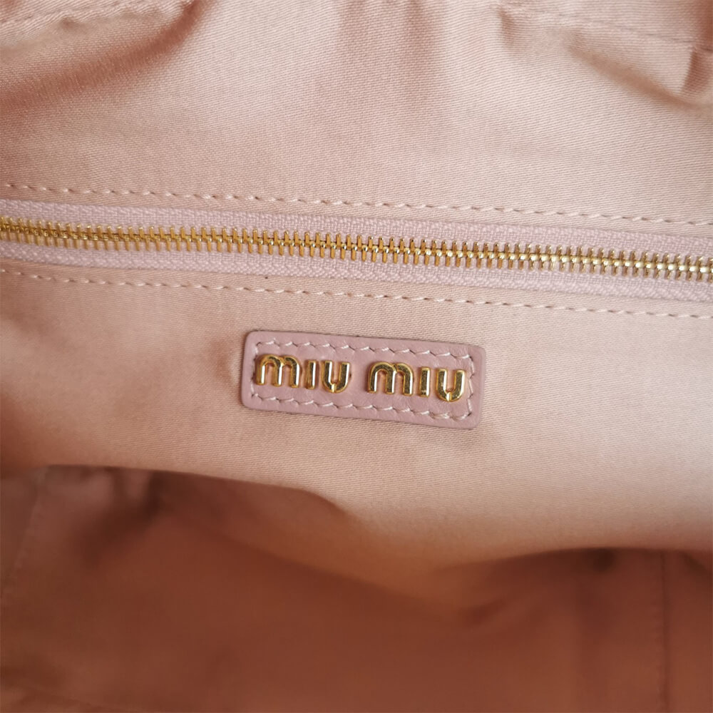 Matelasse nappa leather top-handle bag - Top Club