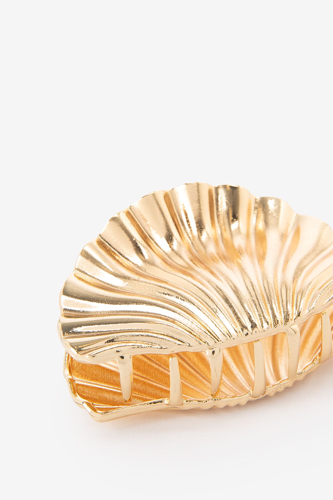Gouden haarklem schelp