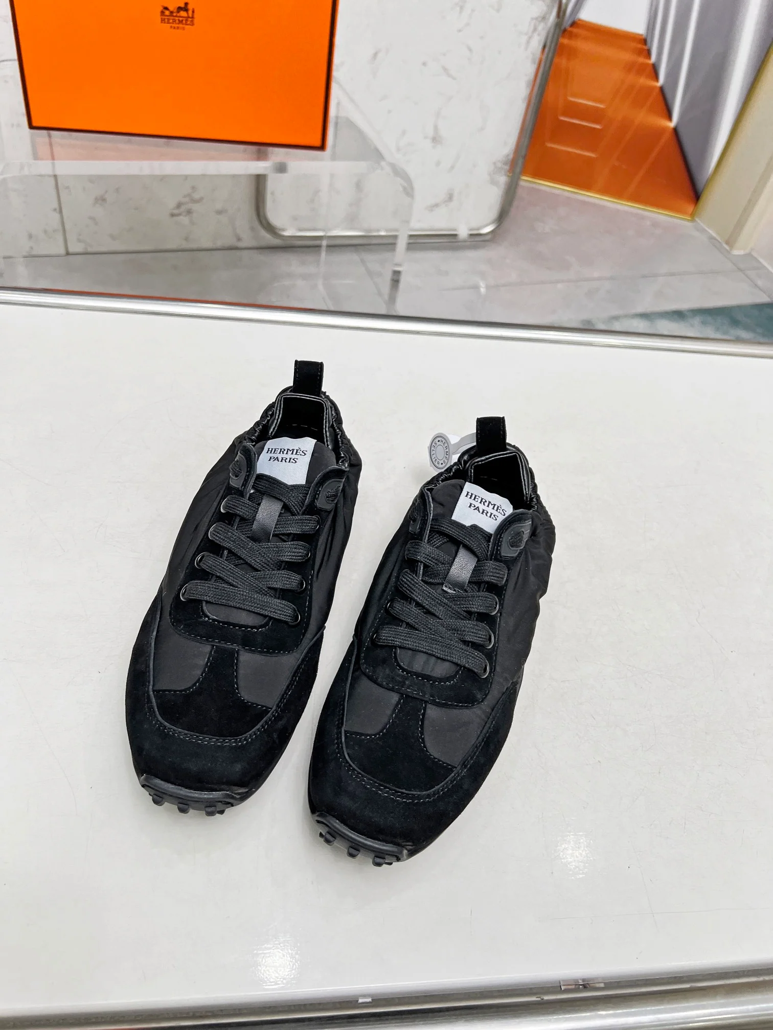 Hermès Unisex All - Black Sneakers For Timeless Luxury Casual Style - Sneaker Replica Workshop