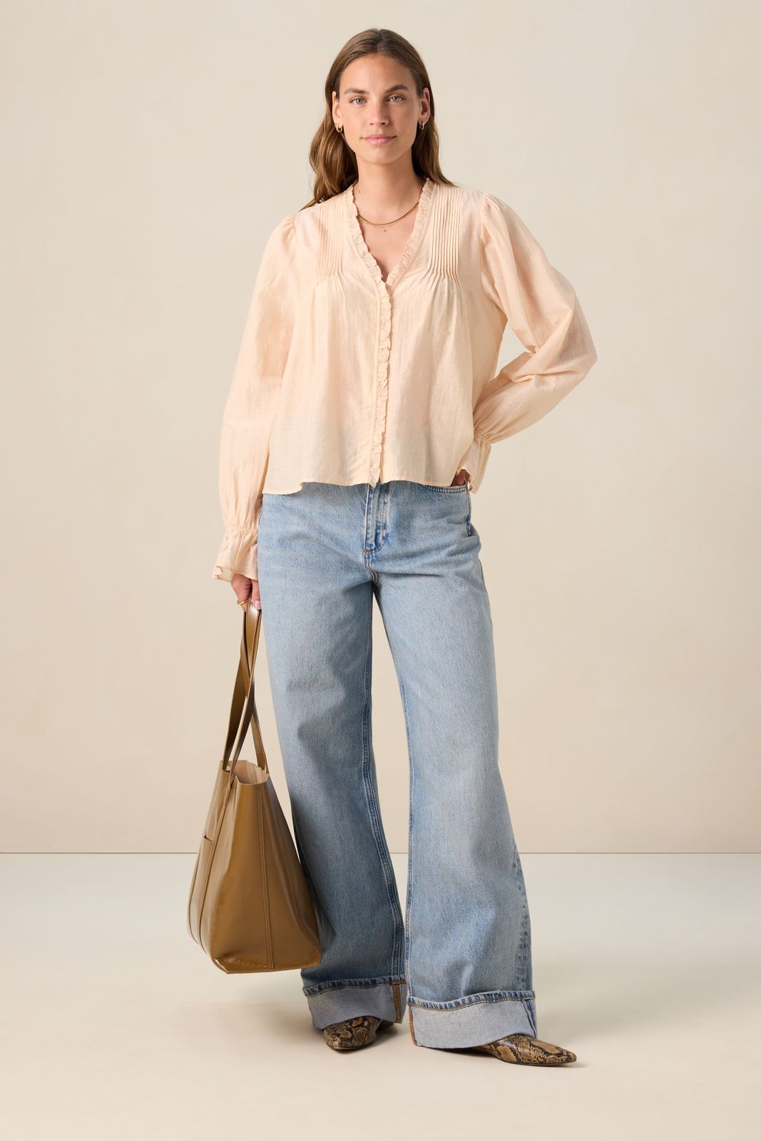 Lichtoranje blouse met ruffles