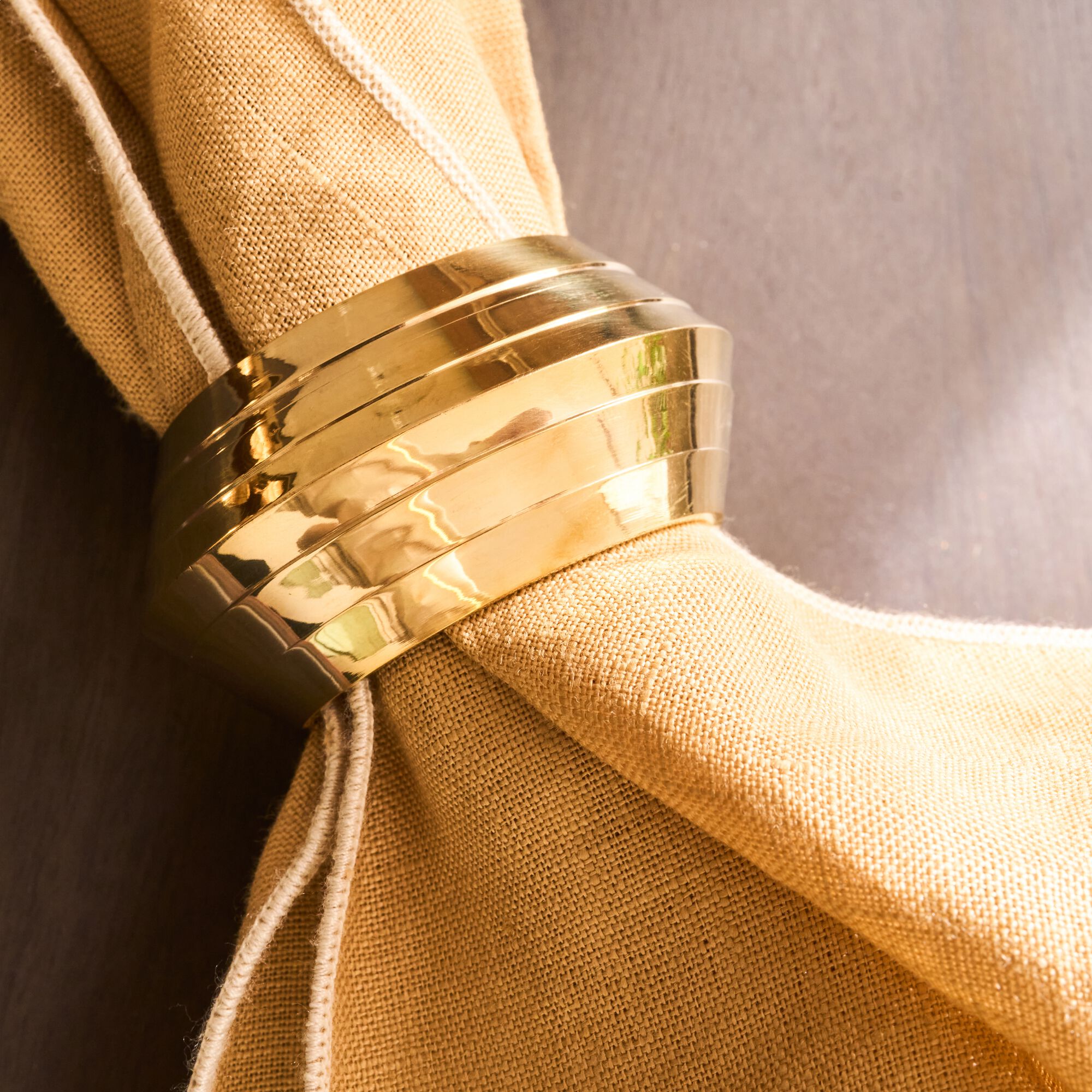 GANGE - Lot de 4 ronds de serviette en laiton - doré