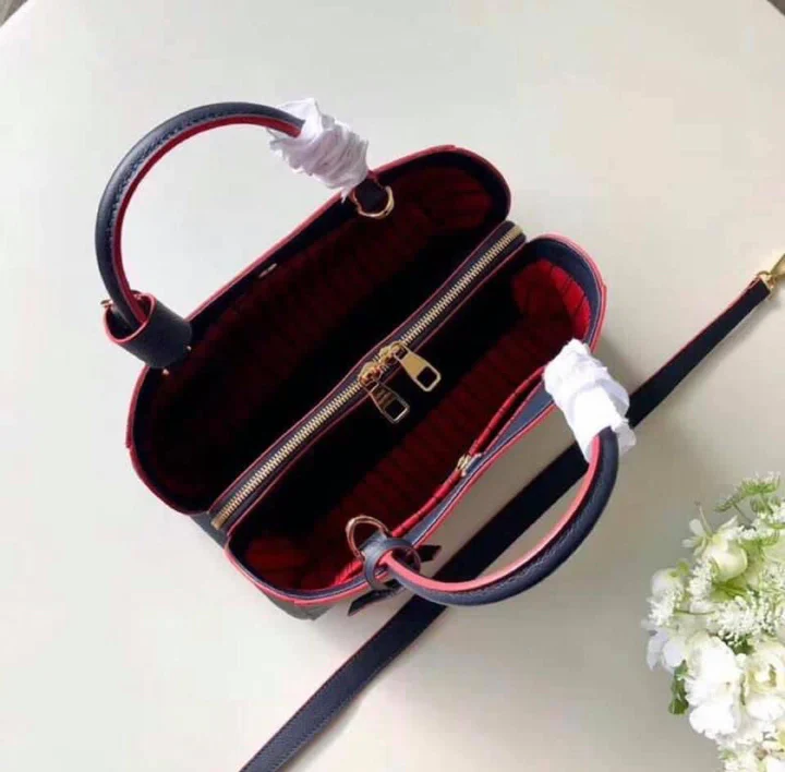 LOUIS VUITTON MONTAIGNE MM BAG - Top Club