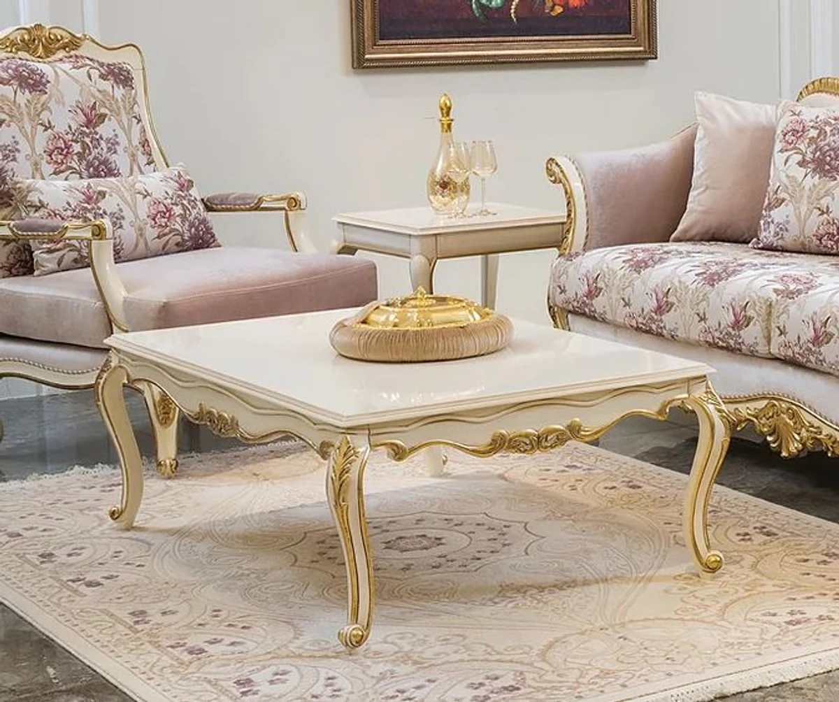 Luxury baroque coffee table white / gold 121 x 81 x H. 44 cm - Noble solid wood living room table in baroque style - Baroque living room furniture