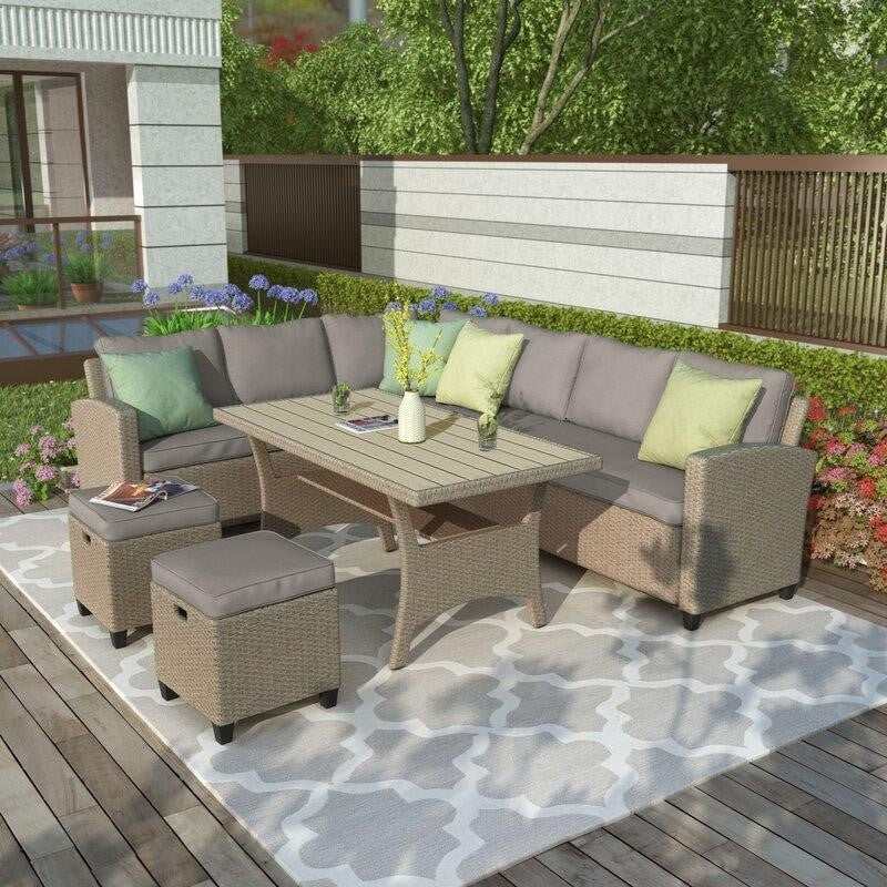 Bradyn Wicker/Rattan 7-person seating group with cushions