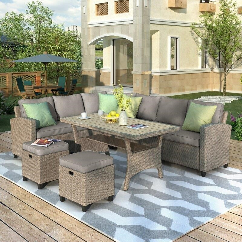 Bradyn Wicker/Rattan 7-person seating group with cushions