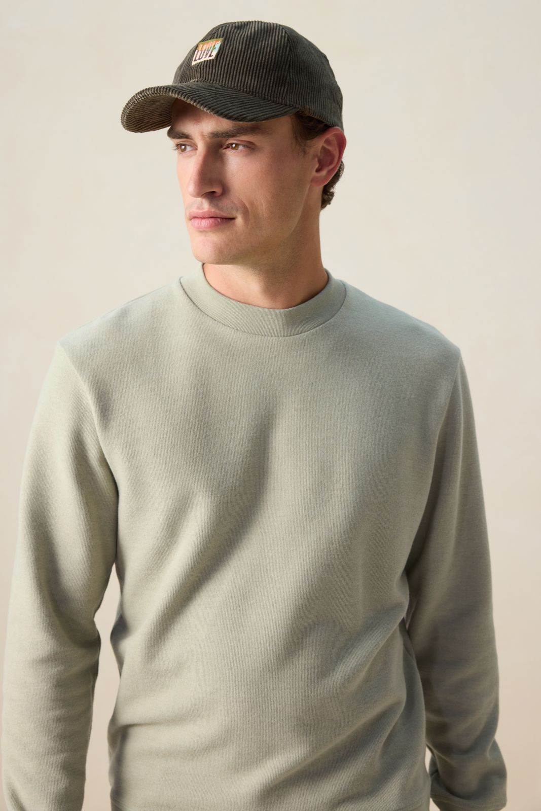 Groene corduroy pet met artwork