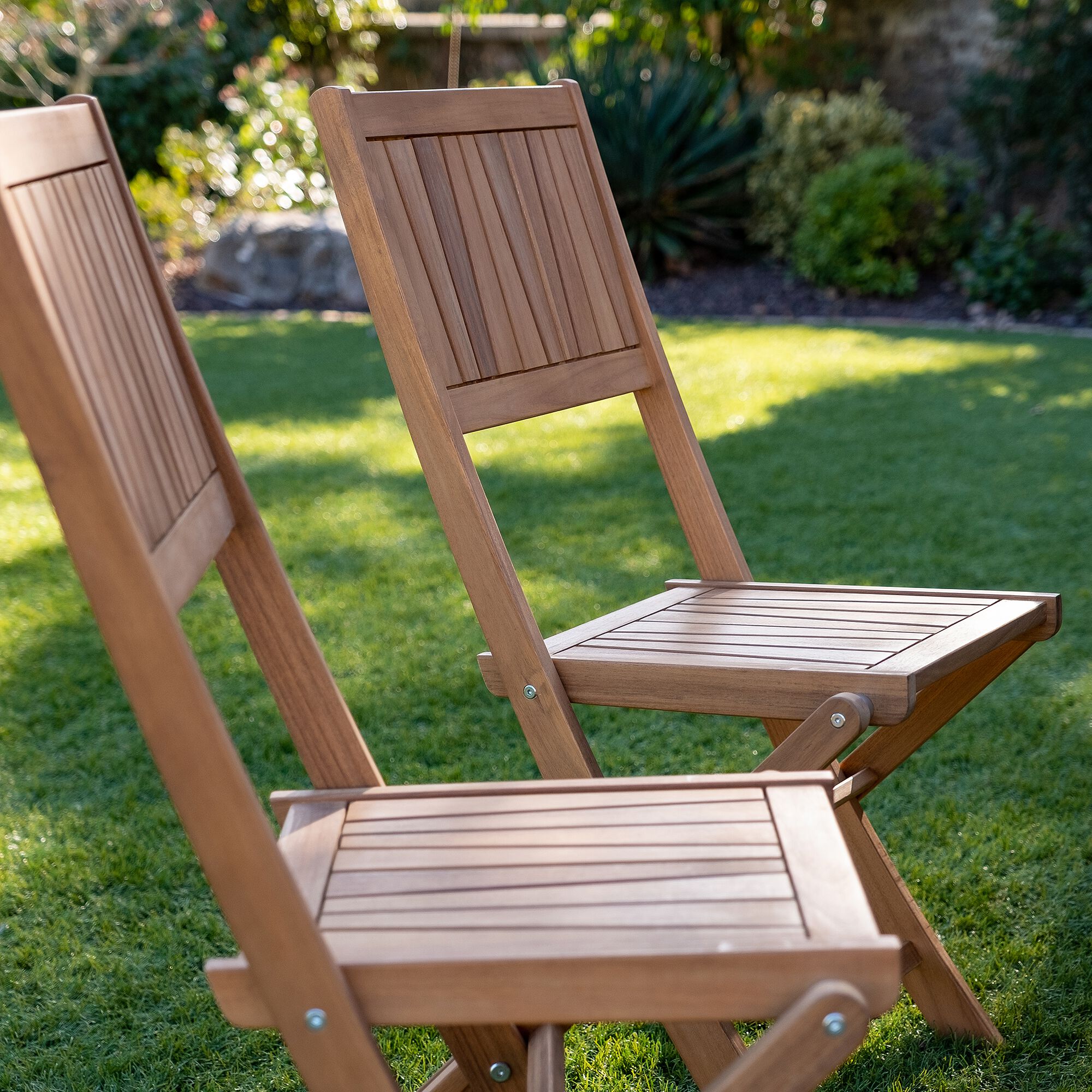 CARLOTI - Chaise de jardin pliante en acacia - bois clair