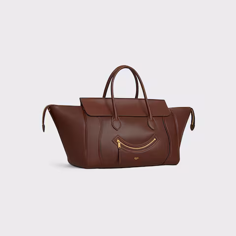 MEDIUM SMILING NEW LUGGAGE IN SUPPLE SHINY LAMBSKIN - Top Club