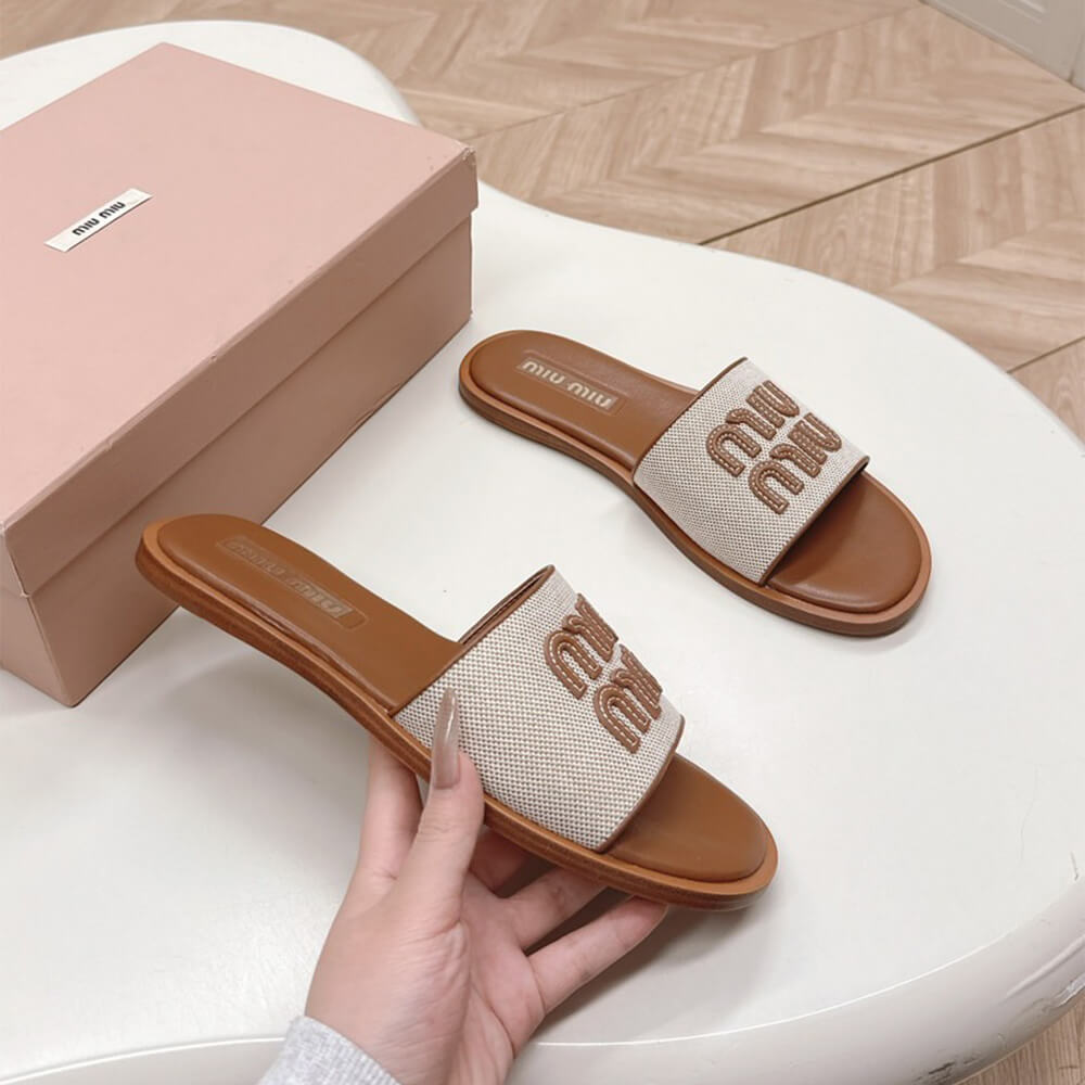 MiuMiu Canvas and leather slides - Top Club