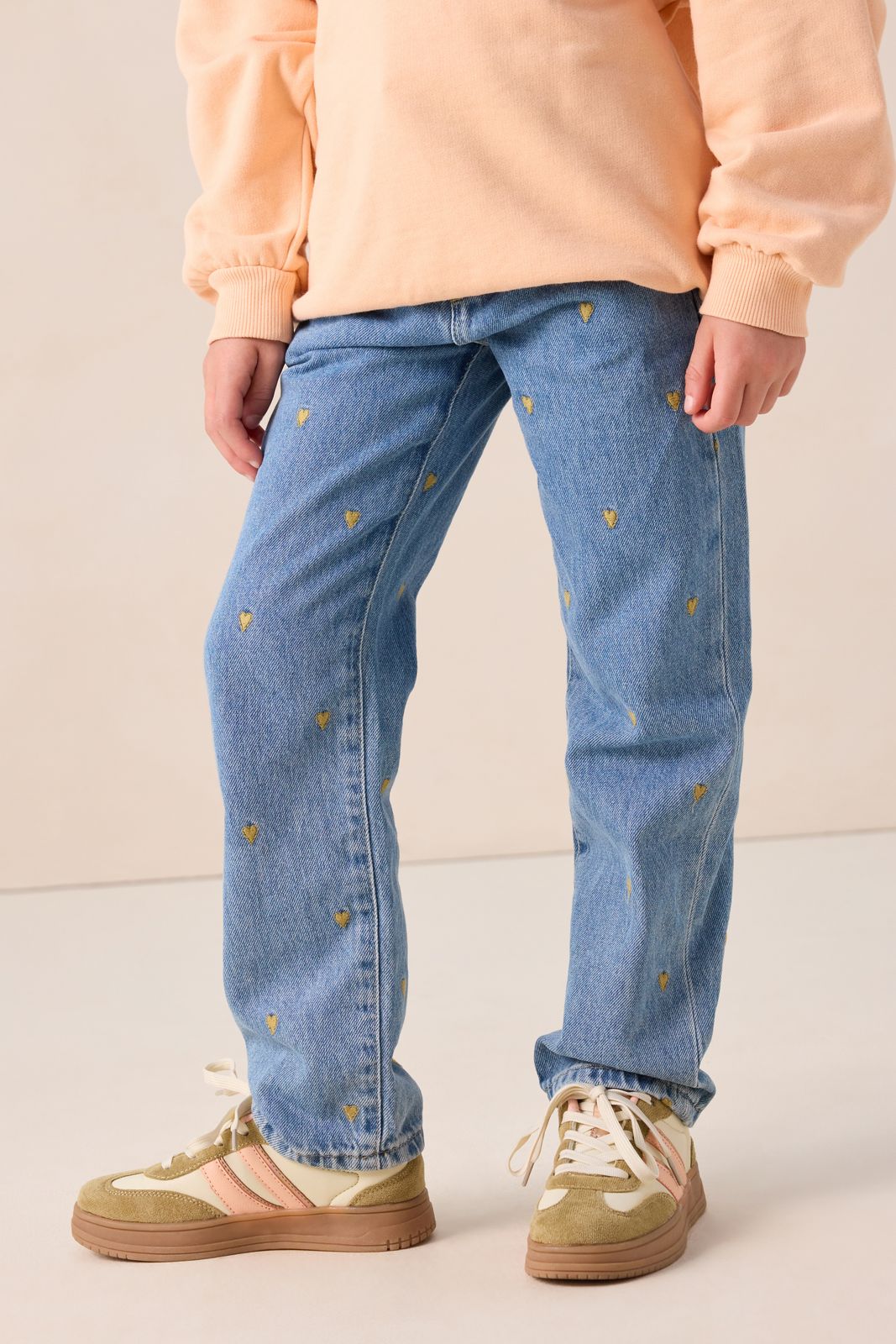 Roze sneakers met strepen