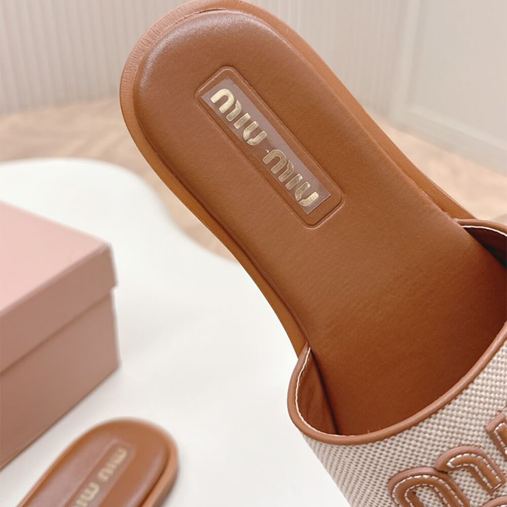MiuMiu Canvas and leather slides - Top Club