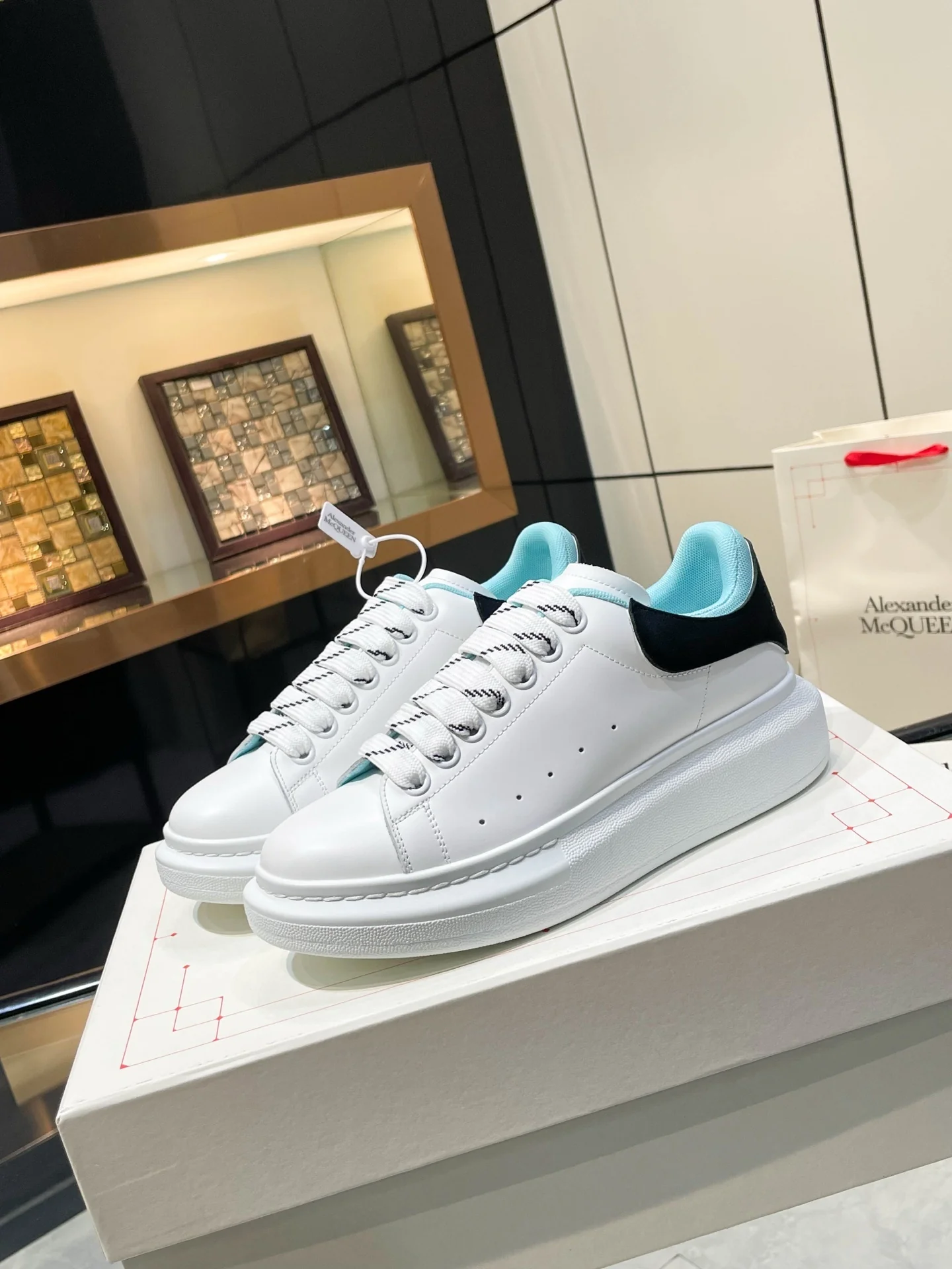 Alexander McQueen Unisex Oversized Sneakers With Blue And Black Accents - Sneaker Replica Workshop