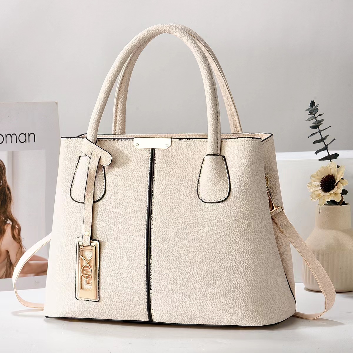 Women's foreign trade bag, simple shoulder bag, PU leather handbag, wholesale large-capacity crossbody bag, bag with metal tag
