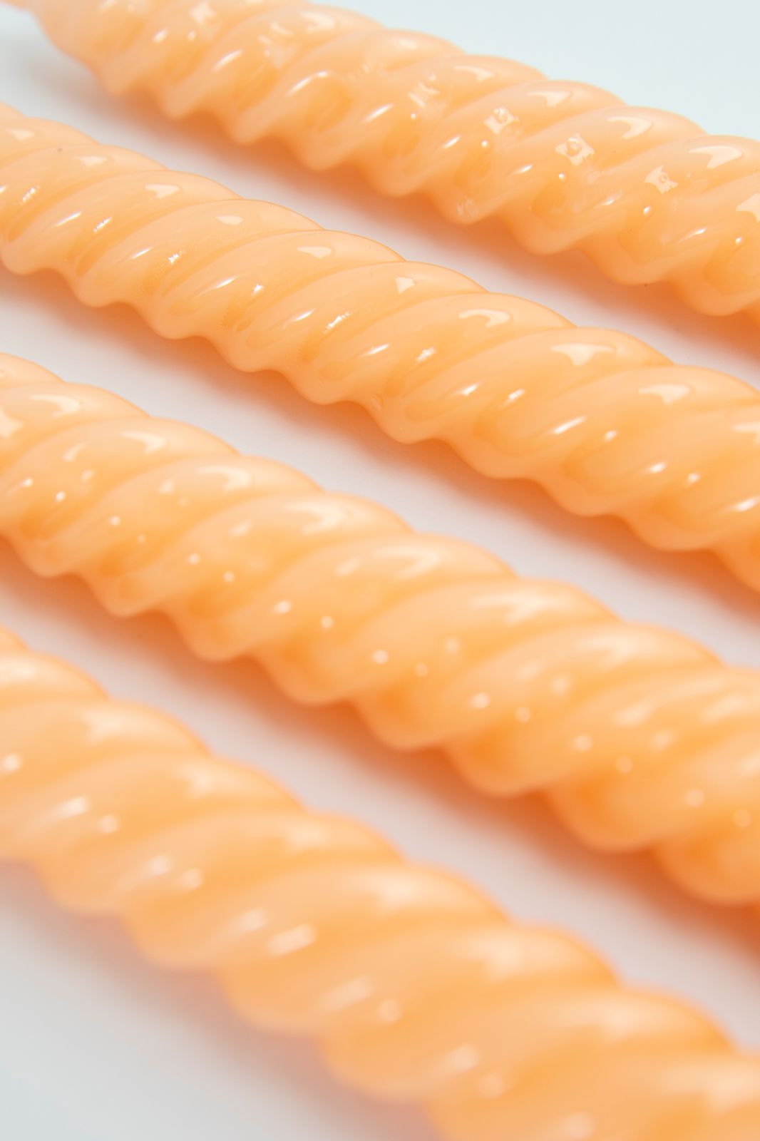 Oranje draaikaarsen 21 cm