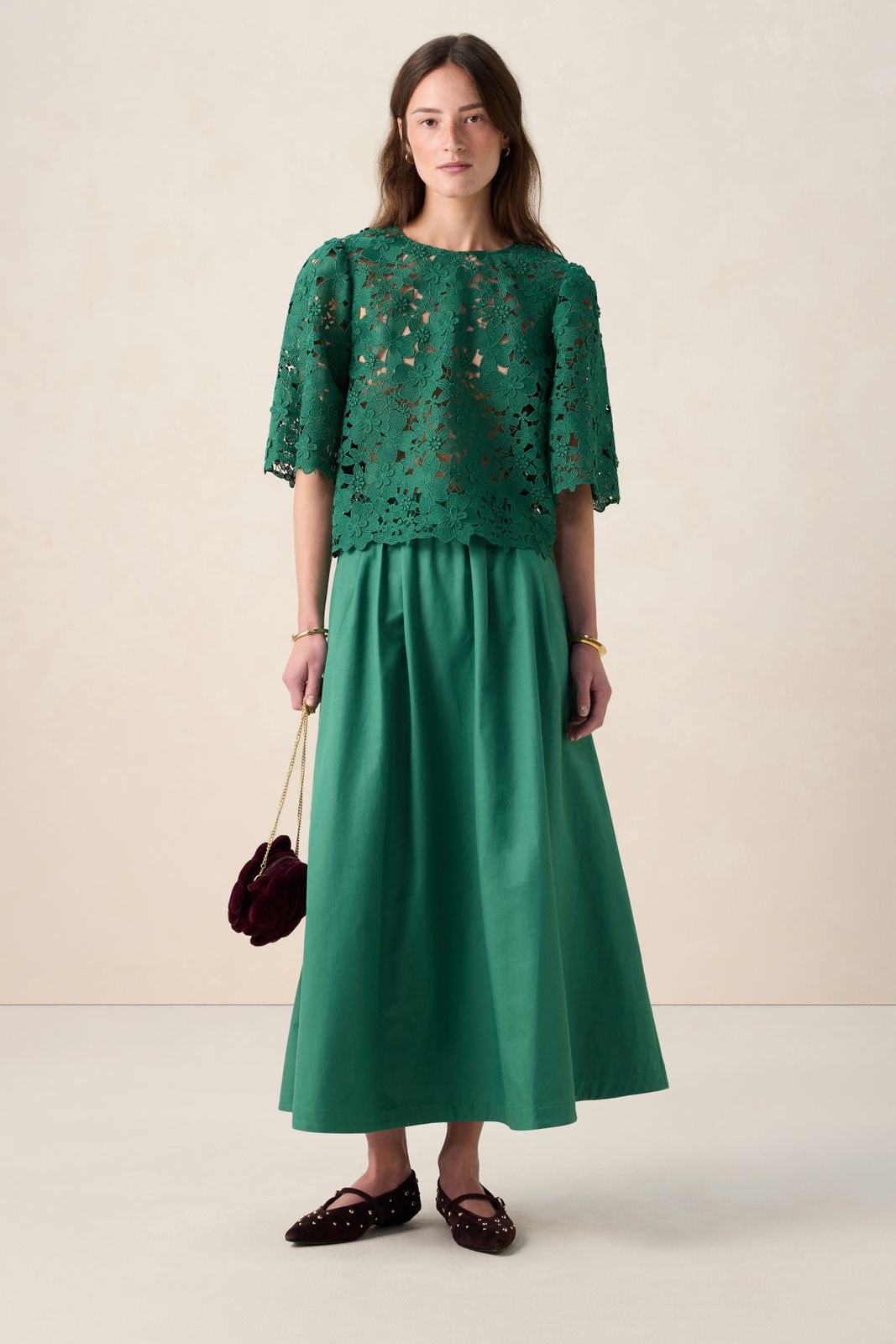 Groene opengewerkte top